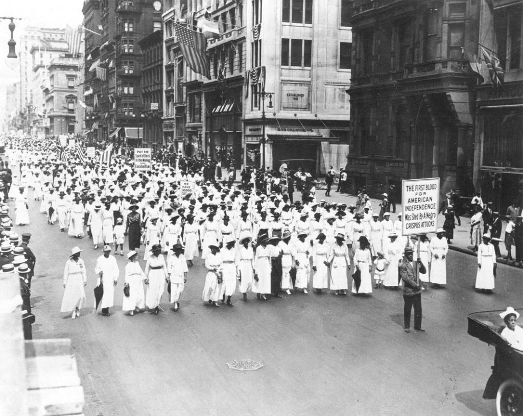 Black and white photograph of a protest against anti-Black violence.